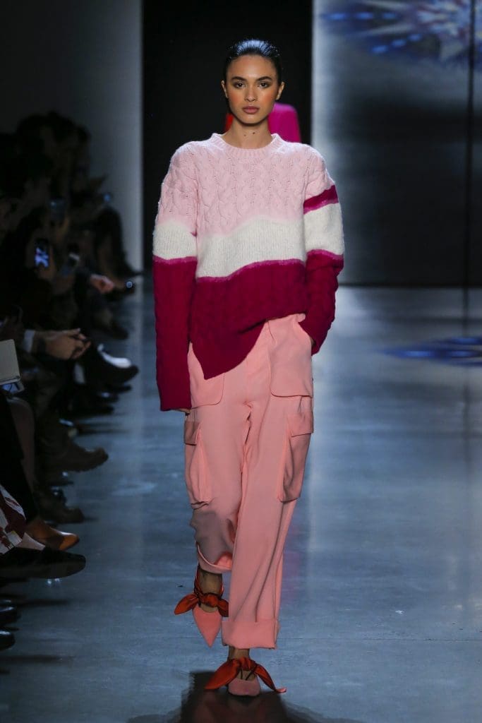 Prabal Gurung azalea wool crewneck sweater with engineered oombre needlepunch, pink cargo pants.