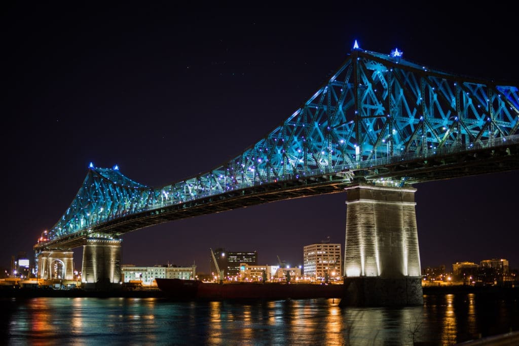 The Jacques Cartier Bridge in Montreal has illumination technology that lights up based on real time social media and urban data (photo from Moment Factory)