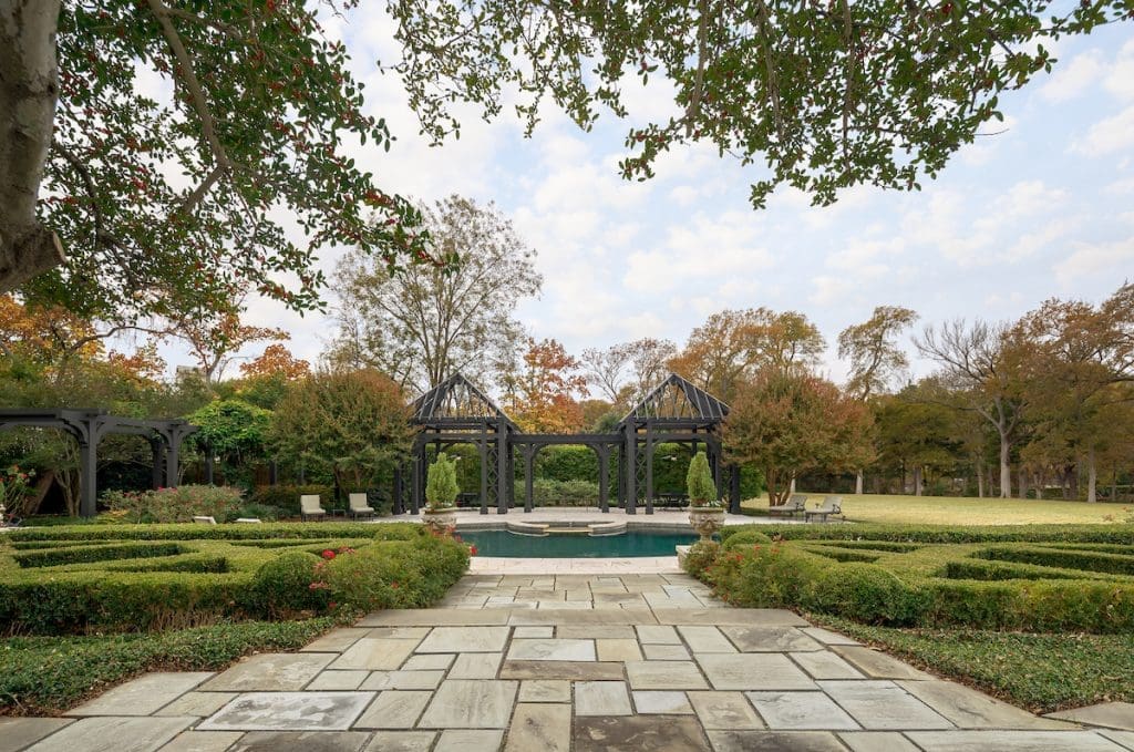 There's a pool with a spa and an outdoor kitchen for entertaining at 4906 Park Lane.