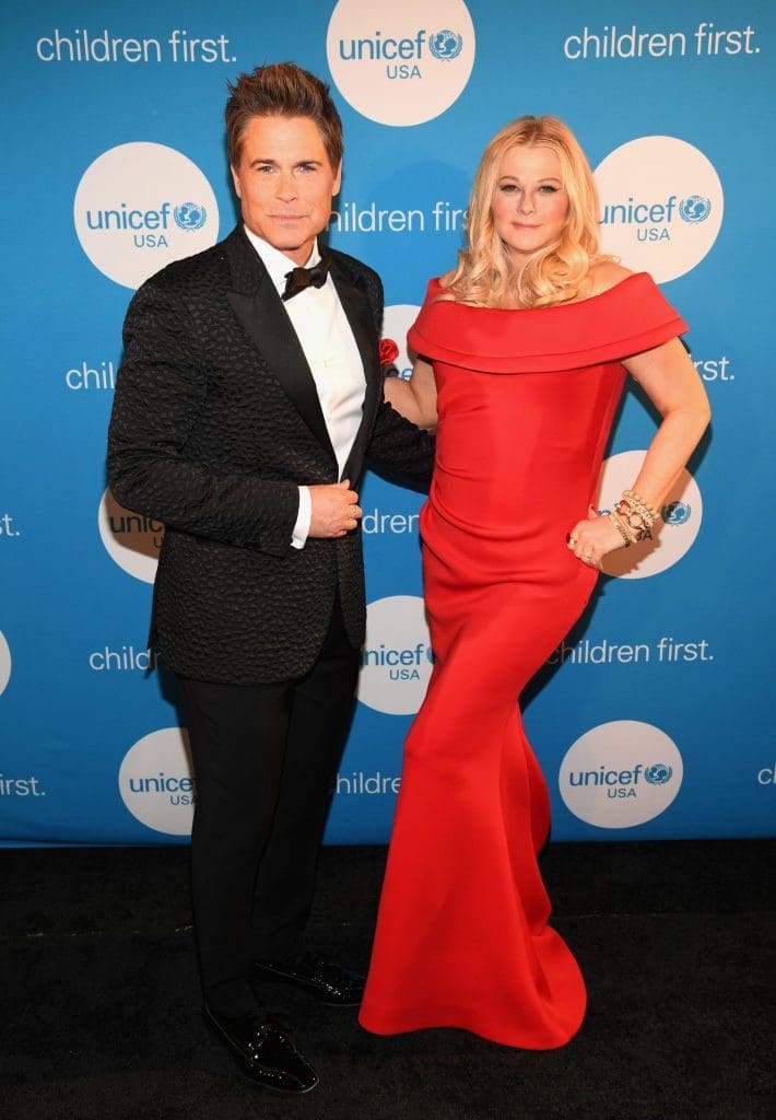 Honoree and Global Philanthropist Award recipients actor Rob Lowe (L) and designer Sheryl Lowe.