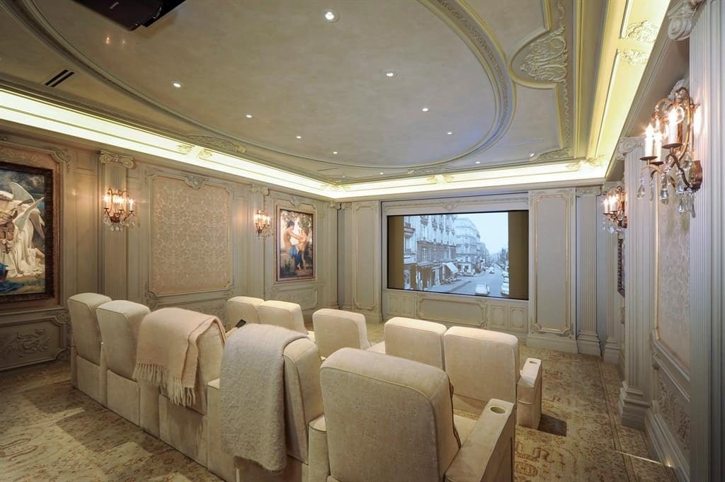 This plush home theater is ideal for movie nights at Chateau Cornarvon.