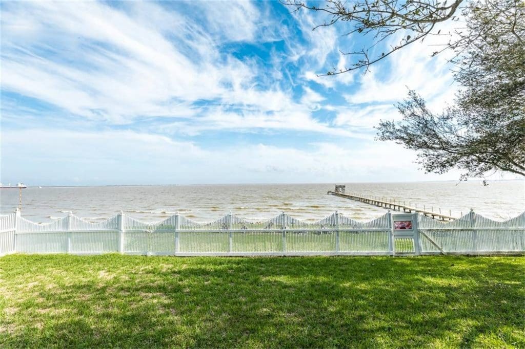 The seaside summer home has a beautiful view of the bay. 