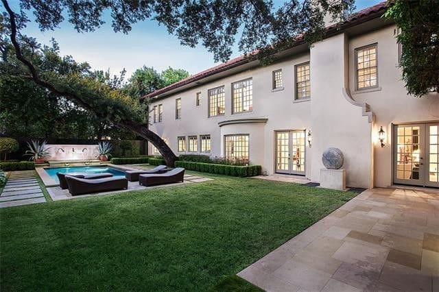 The exterior is meticulously landscaped. 