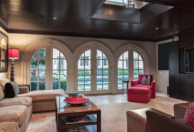 The pool house has its own kitchenette and living area. 