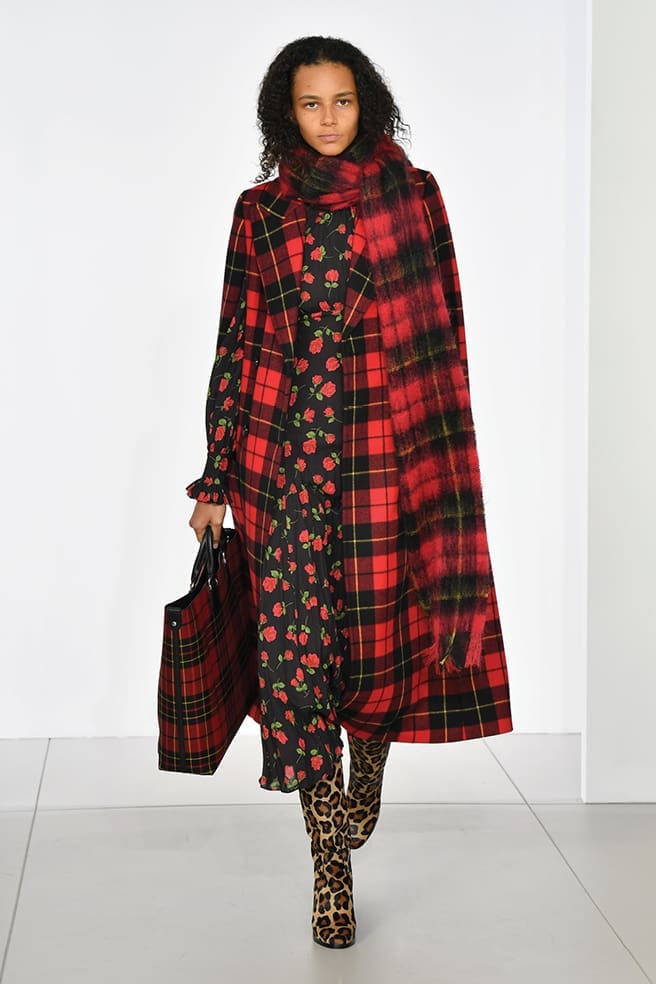 Michael Kors tartan cape and scarf, floral dress, leopard pattern boots.