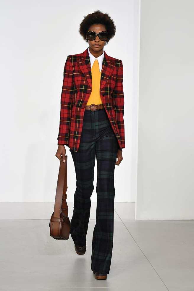 Michael Kors tartan blazer and contrasting tartan slacks.