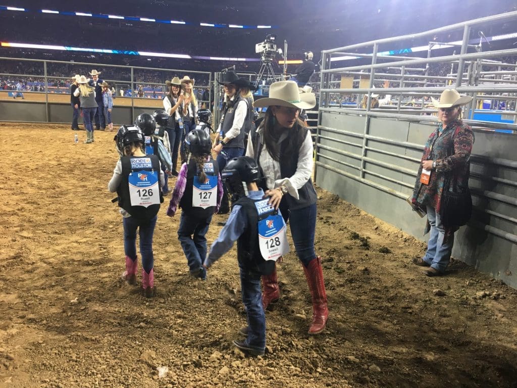 Busters stride out into the arena.