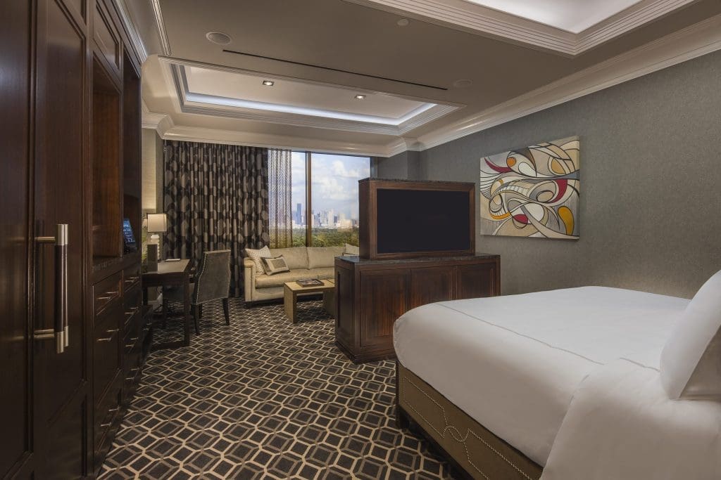 The Post Oak's standard rooms come with three TVs and plenty of plush touches.