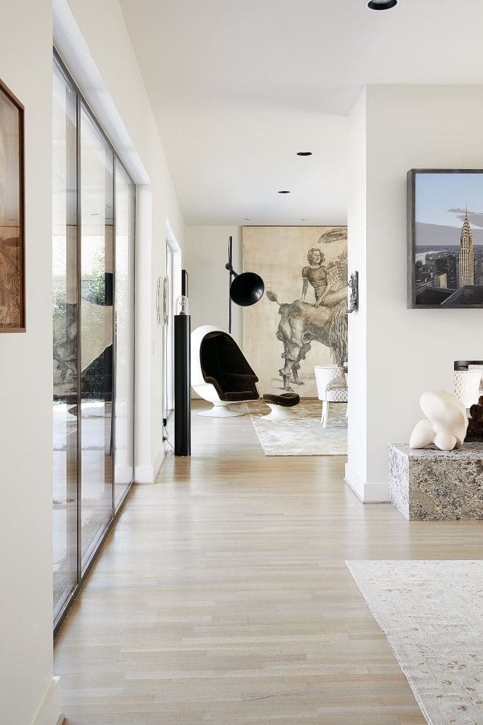 Paul Fryer’s air-raid-siren "Intempesta Nox", 2005, with Wolfe Von Lenkiewicz’s "Dora", 2009. Stereo Alpha egg chair and
ottoman, circa 1970. In foreground, Stephen Hannock’s "New York Skyline", 1980. Mike Cunningham’s "Torso/Nautilus", 1989.