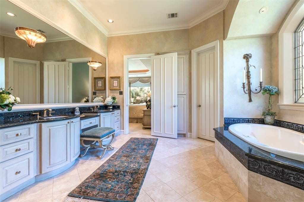 There's storage galore in the master bath, with two walk-in closets. 