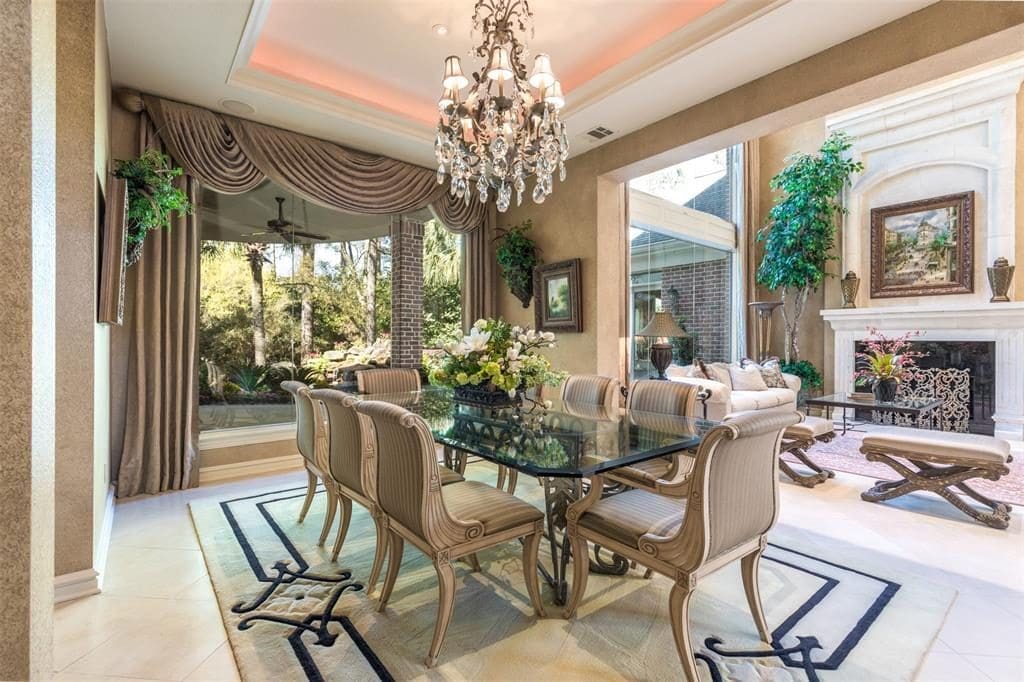The finest accents of this formal dining room include a crystal chandelier, cove ceiling moldings and recessed lighting. 