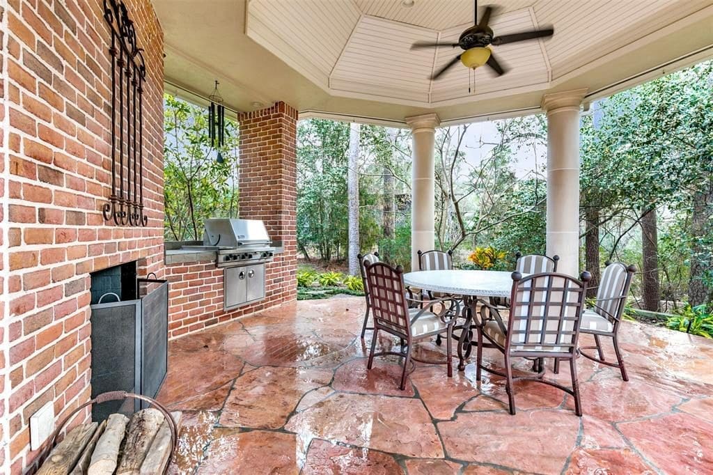 The gazebo is a great space for a cozy barbecue with a built-in gas grill and built-in speakers. 
