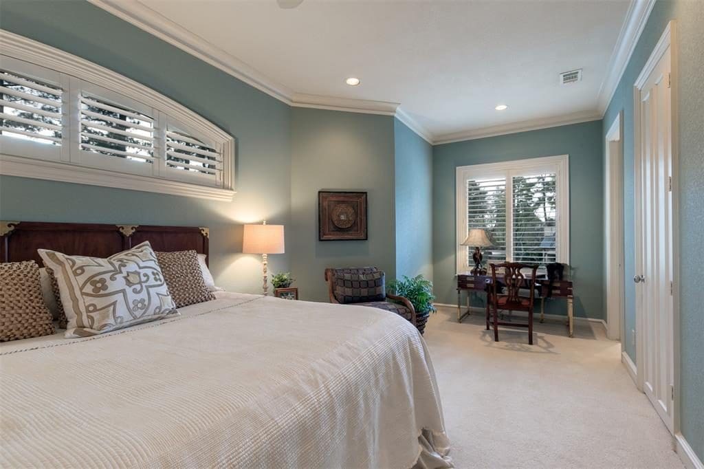 Built-in book cases with adjustable shelves and a walk-in closet make the second bedroom as comfortable as can be. 