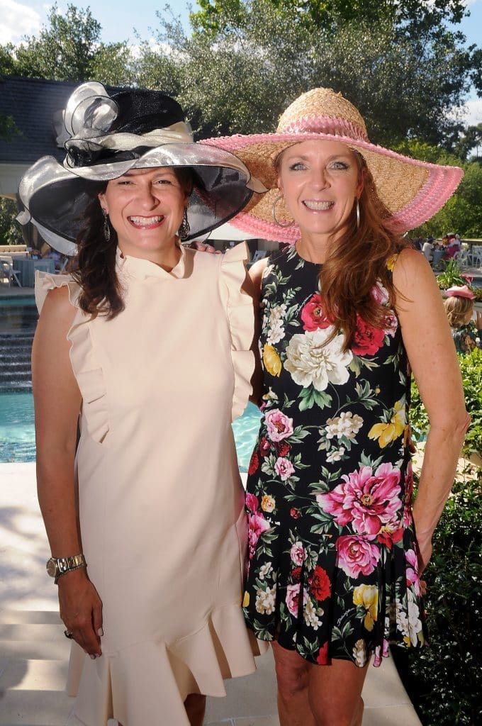 Deanna Barton and Paige Fertitta at Hats, Hearts & Horseshoes: A Kentucky Derby Affair benefitting Bo's Place at Fertitta's home in 2018. (Dave Rossman Photo)