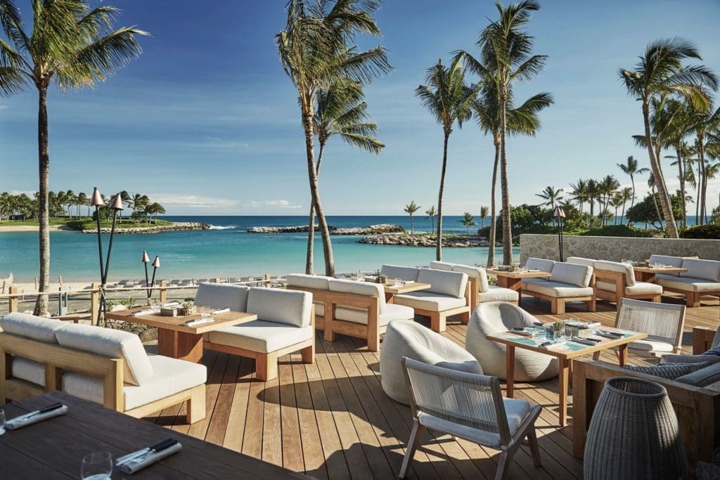 Mina's Fish House's patio basks in the Hawaiian sunlight. 