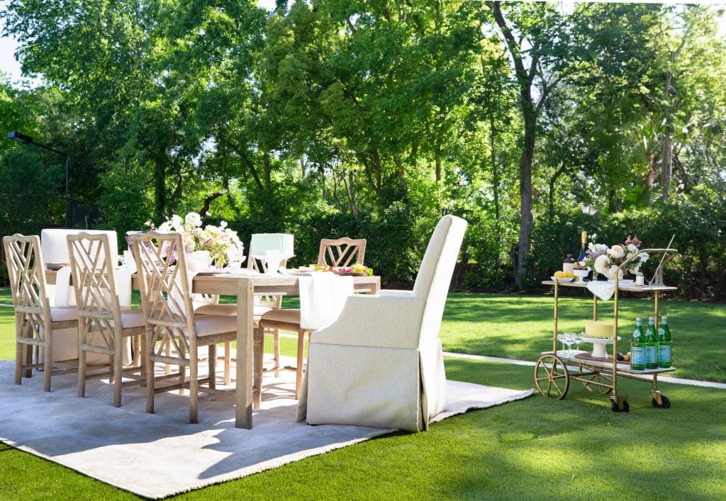 Don't be afraid to bring indoor furniture outside to create an intimate vibe.