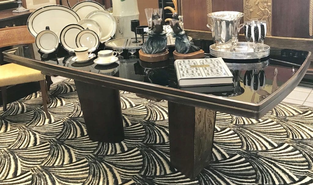Consorzio Esposizione Mobili Cantu Vittorio Dassi dining table, among the treasures being sold to benefit the estate of Mickey Rosmarin. As he was a tastemaker with his founding of Tootsies in 1974, Rosmarin's eye for Deco and moderne furniture was equally noteworthy. Besides significant furnishings, the public will have a chance to acquire objects, books, and ephemera owned by the late, larger-than-life retail legend. 