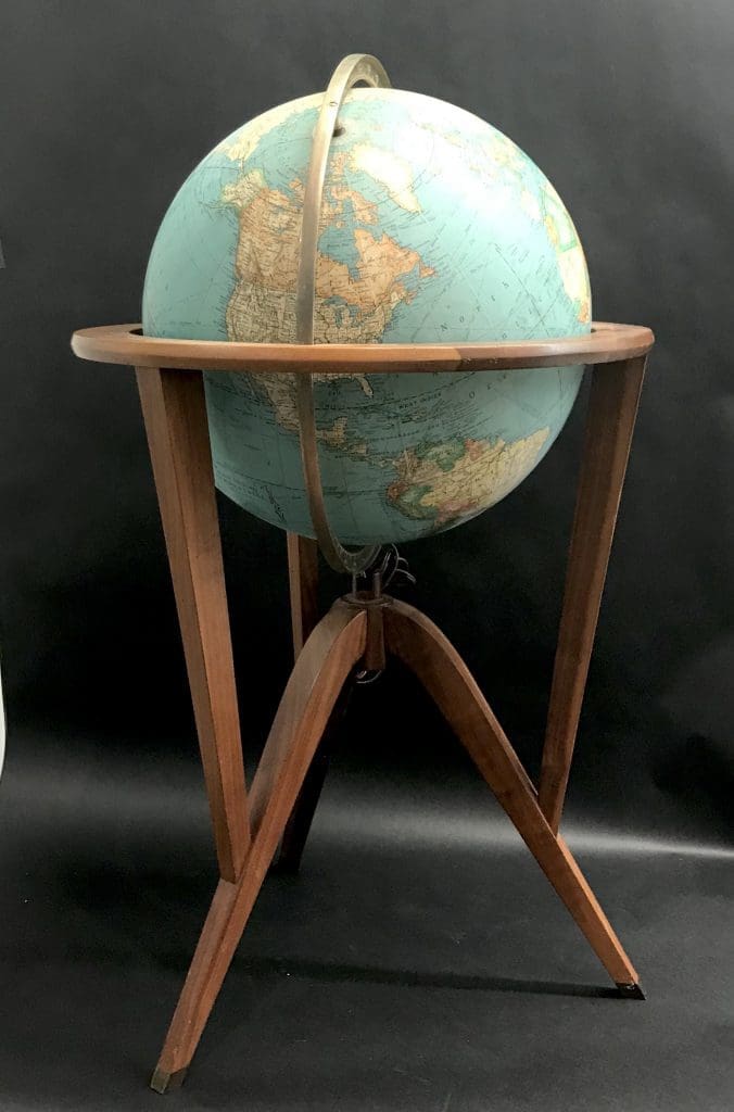 This collectible globe on a stand by Edward Wormley for Dunbar is among the mid-century finds at the Mickey Rosmarin estate sale. 