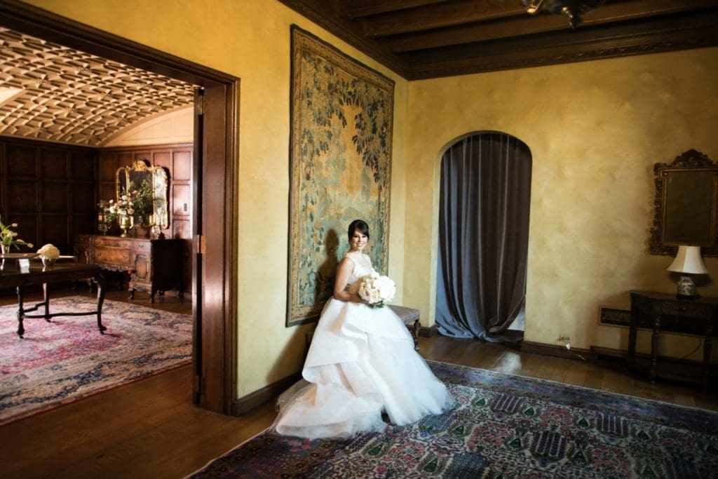 Katie Bivins at the Amarillo Tudor Revival estate formerly owned by her grandparents and great-grandparents (Photo by Samuel Lippke Studios)
