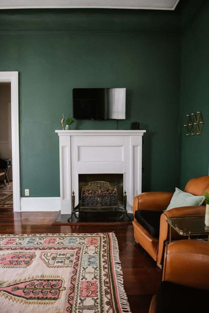 Eddings wanted a masculine feel for The Merchant, but felt the pink rug provided balance. 