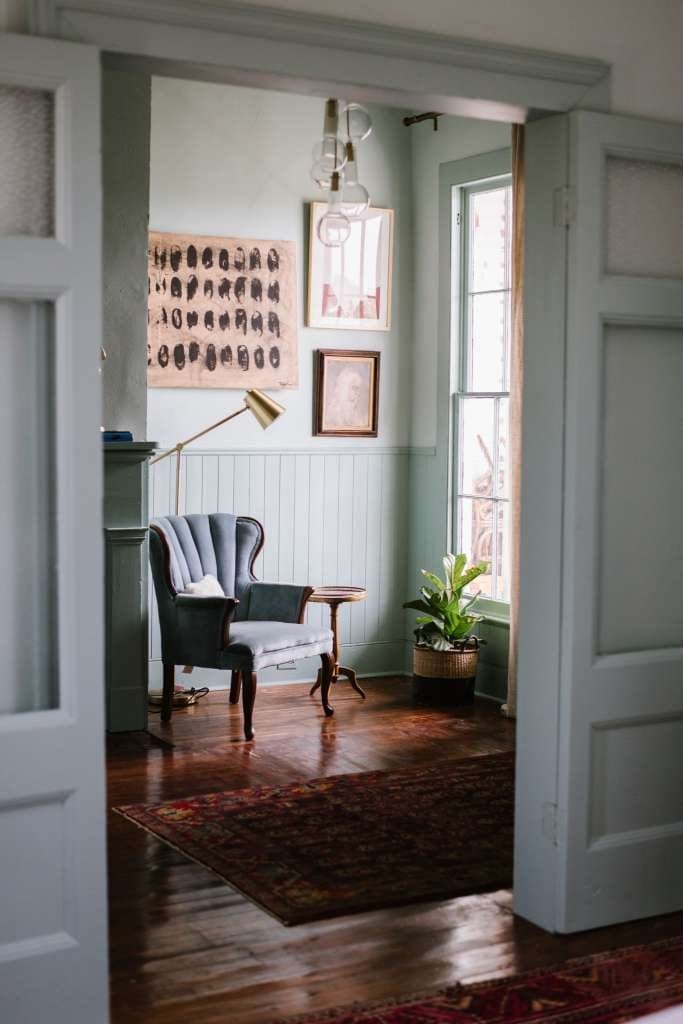 Stately teal walls open up to The Newlyweds. 