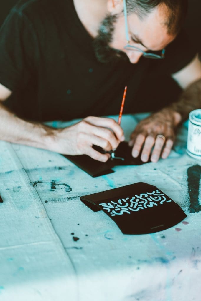 Each piece of the limited edition collection is hand-painted by the artist. 