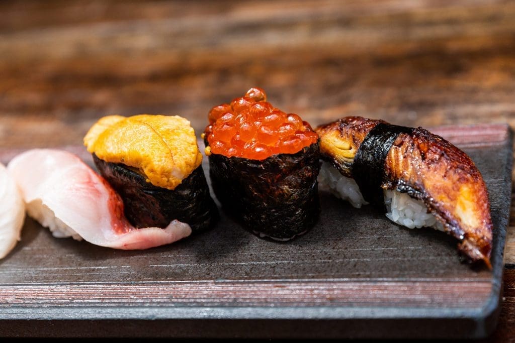 Kata Robata's Golden Eye Snapper (Kinmedai), Uni, Salmon Roe, Unagi (freshwater eel) (Photo by Julie Soefer.)