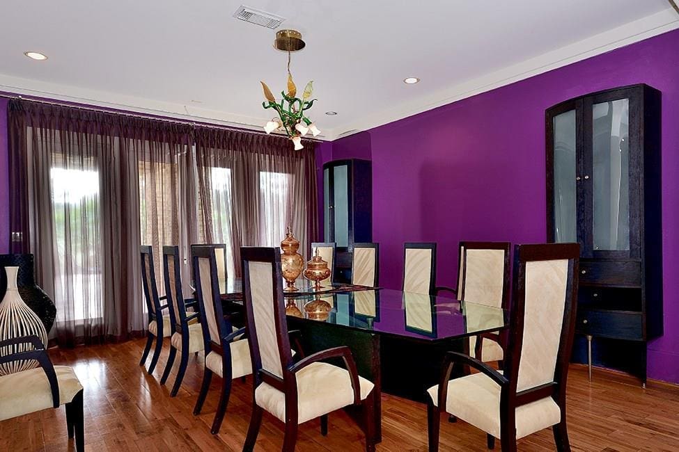 Tall floor-to-ceiling windows keep the dining rooms light and breezy. 