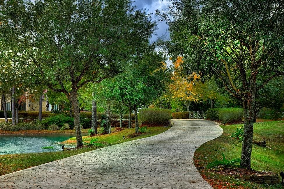 A winding path leads up to the gate. 