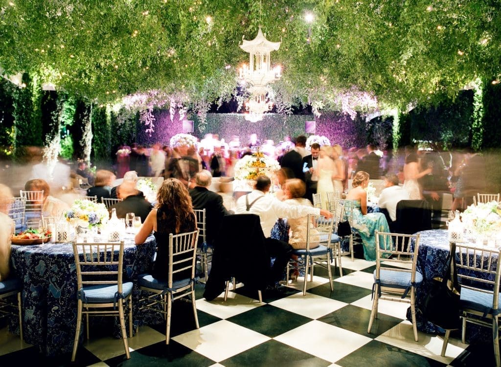 Custom tablecloths made in Quadrille cotton and her mother’s crystal pagoda chandeliers hung throughout the wedding and after-party tents.