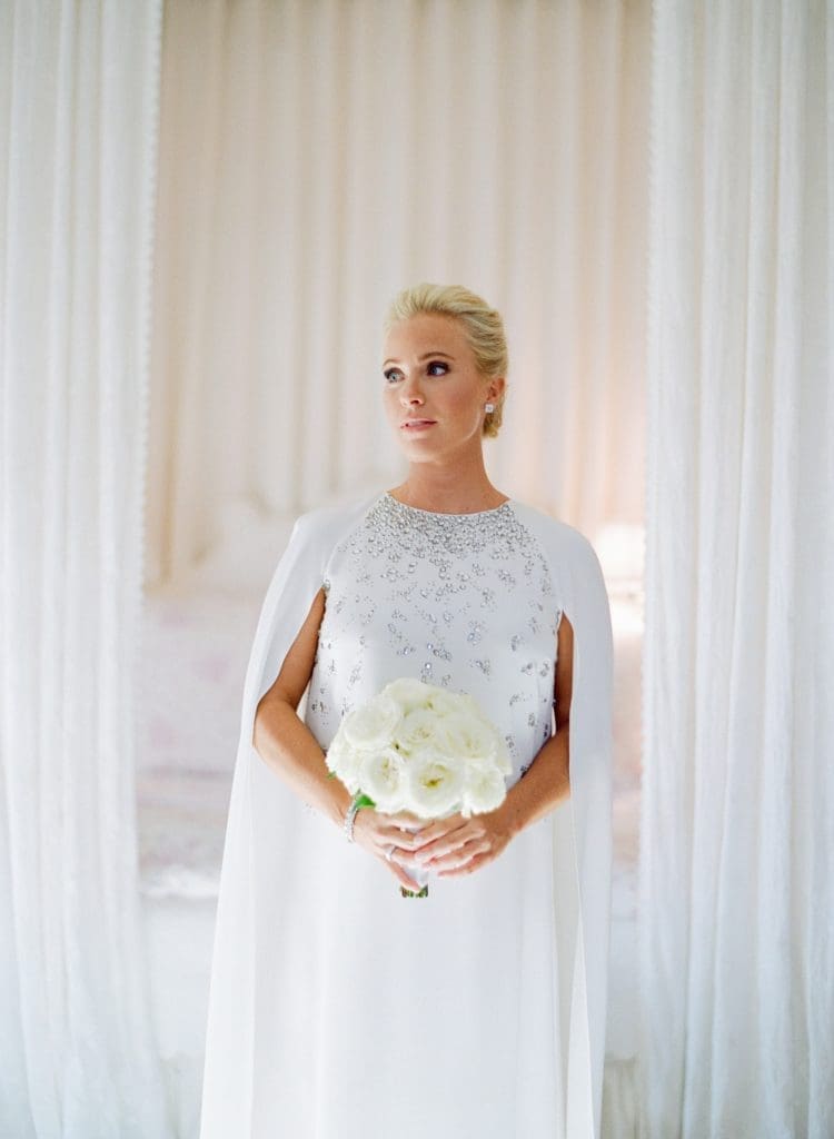 Ashley Pittman's mom found her nontraditional caped Oscar de la Renta column gown a couple days before the wedding. Photos by Jose Villa. (Photo by Jose Villa)