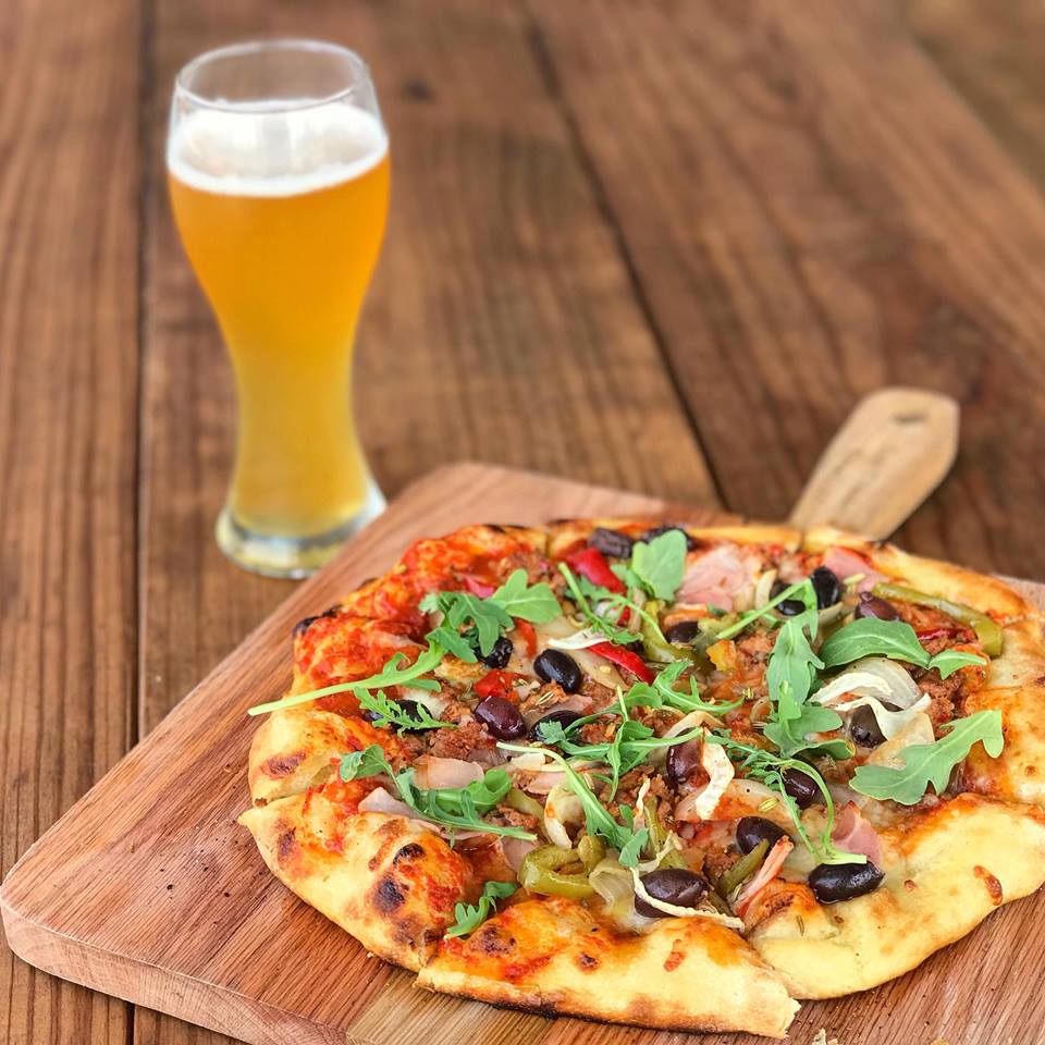 The pizza crust is made from scratch. 