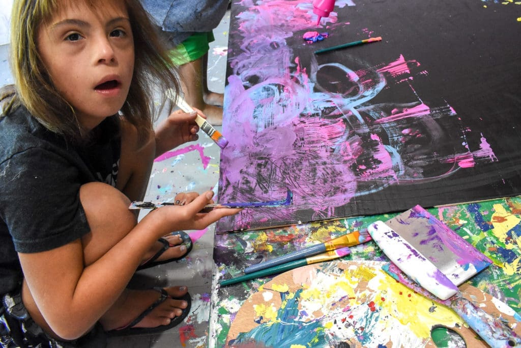 Sevy works with an array of tools as she paints, even using two different tools at once. (Photo Miranda Proctor)