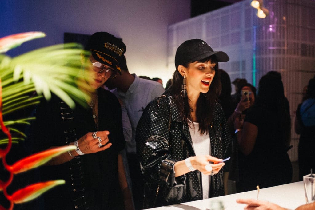 Dallas’ Most Mysterious Garden Party Turns Into a Rainforest: But Water Can’t Stop These Daring Party People