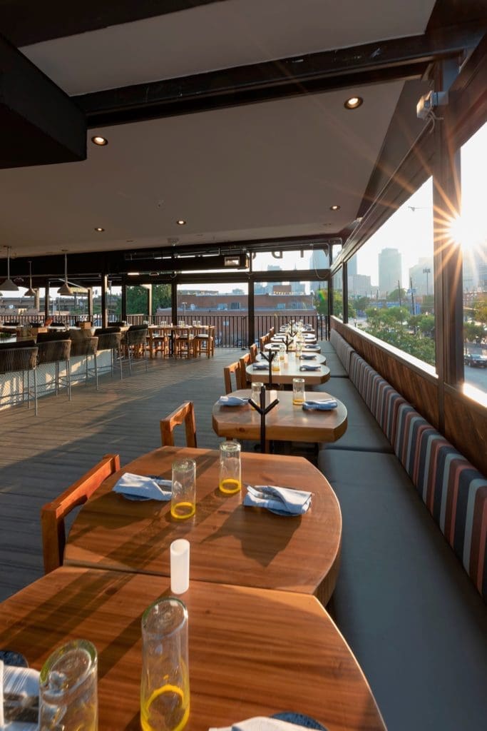 The restaurant features a 2,000-square-foot rooftop patio overlooking the Dallas skyline. 