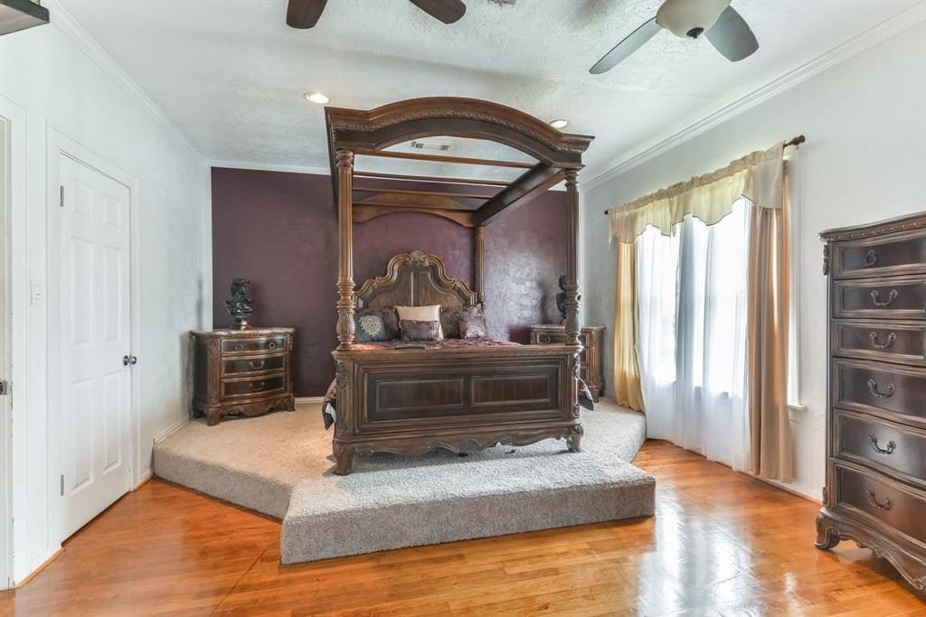 The master suite has an elevated platform. 