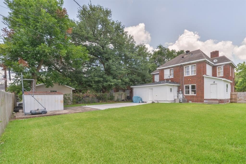 The backyard is massive, perfect for entertaining. 