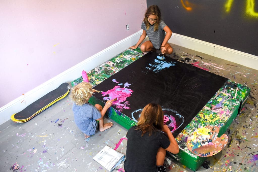 Radko and Ace get in on the first layer of paint. (Photo Miranda Proctor)