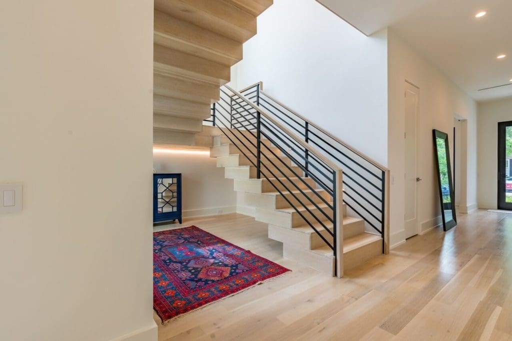 The custom staircase is one-of-a-kind. 