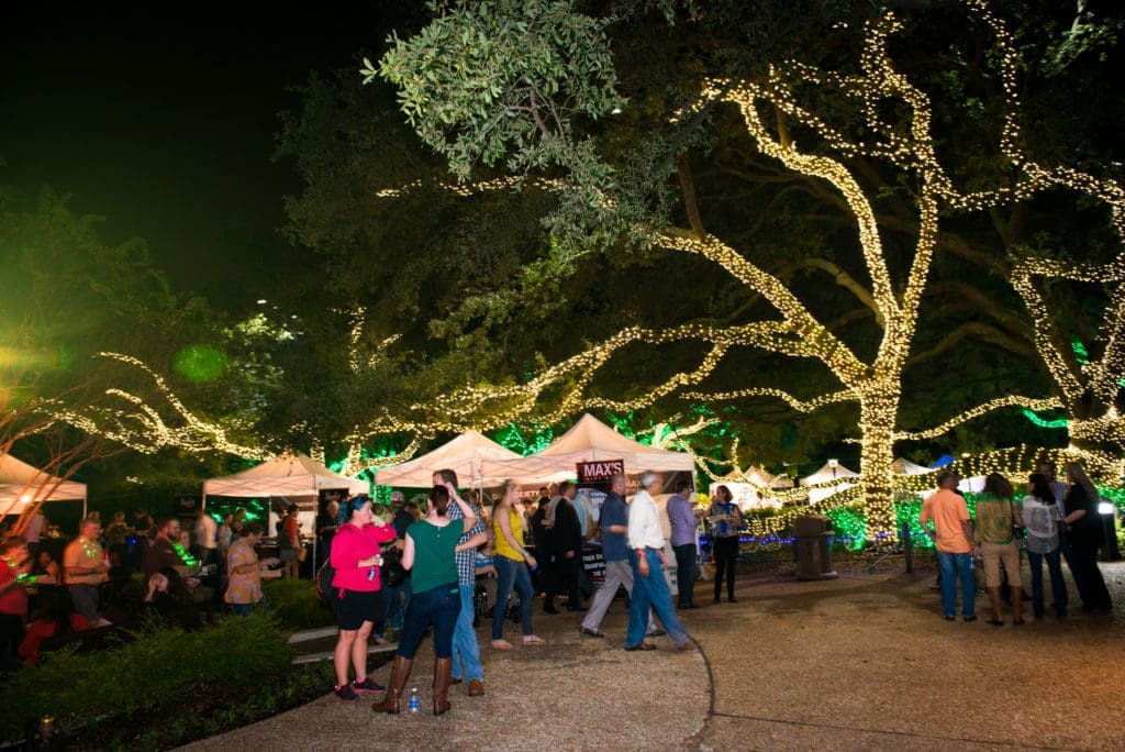 Houston Zoo's 'Feast with the Beasts' transforms zoo grounds into a rollicking night scene.