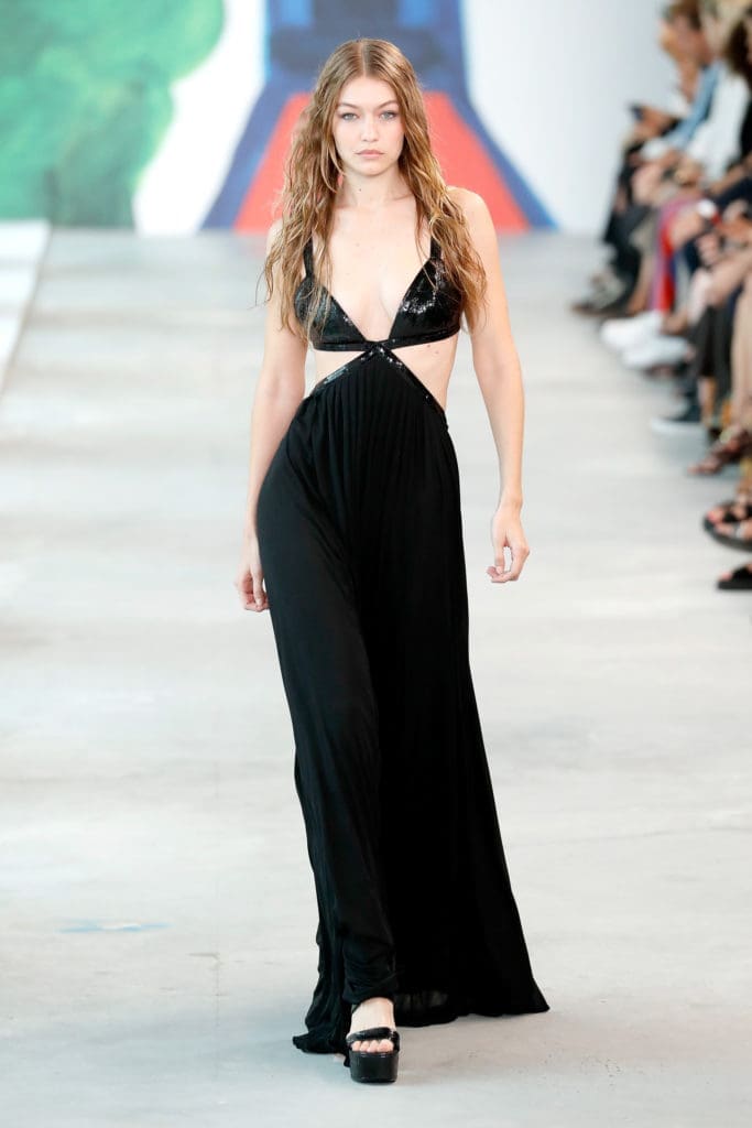 NEW YORK, NY - SEPTEMBER 12:  Model Gigi Hadid walks the runway during the Michael Kors Collection Spring 2019 Runway Show at Pier 17 on September 12, 2018 in New York City.  (Photo by JP Yim/Getty Images for Michael Kors)