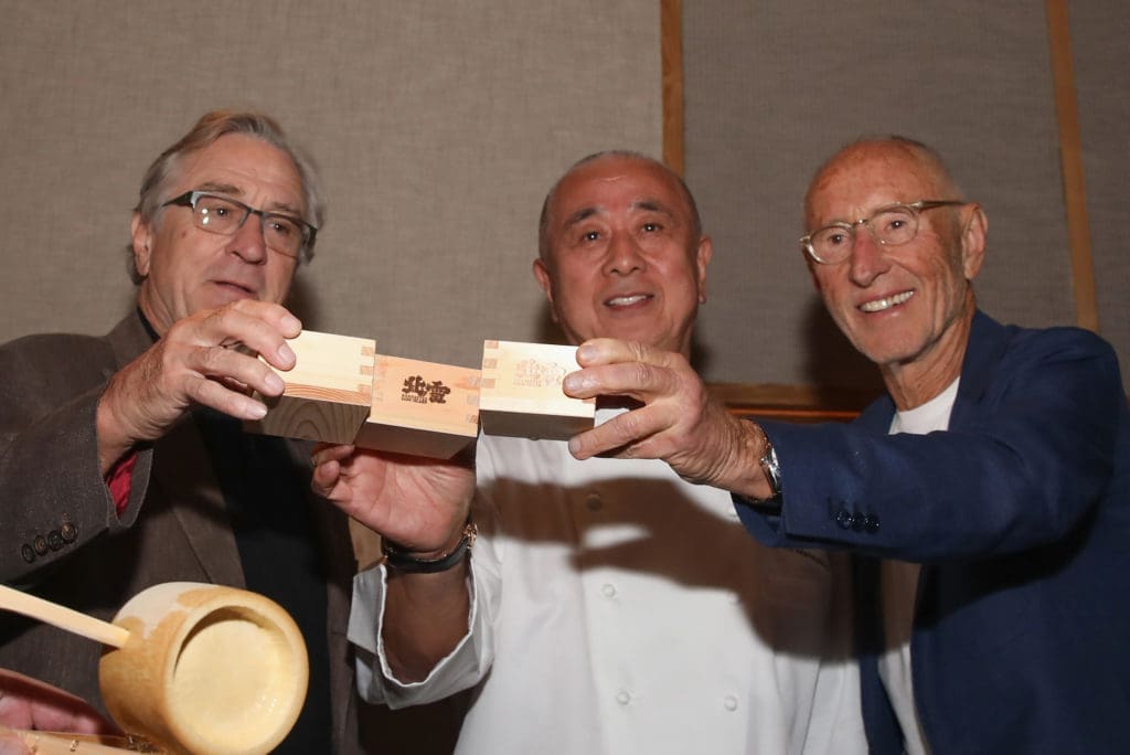 HOUSTON, TX - OCTOBER 18: (L-R) Nobu Founders Robert De Niro, Chef Nobu Matsuhisa, and Meir Teper at Nobu Houston Sake Ceremony on October 18, 2018 in Houston, Texas.  (Photo by Rick Kern/Getty Images for Nobu)