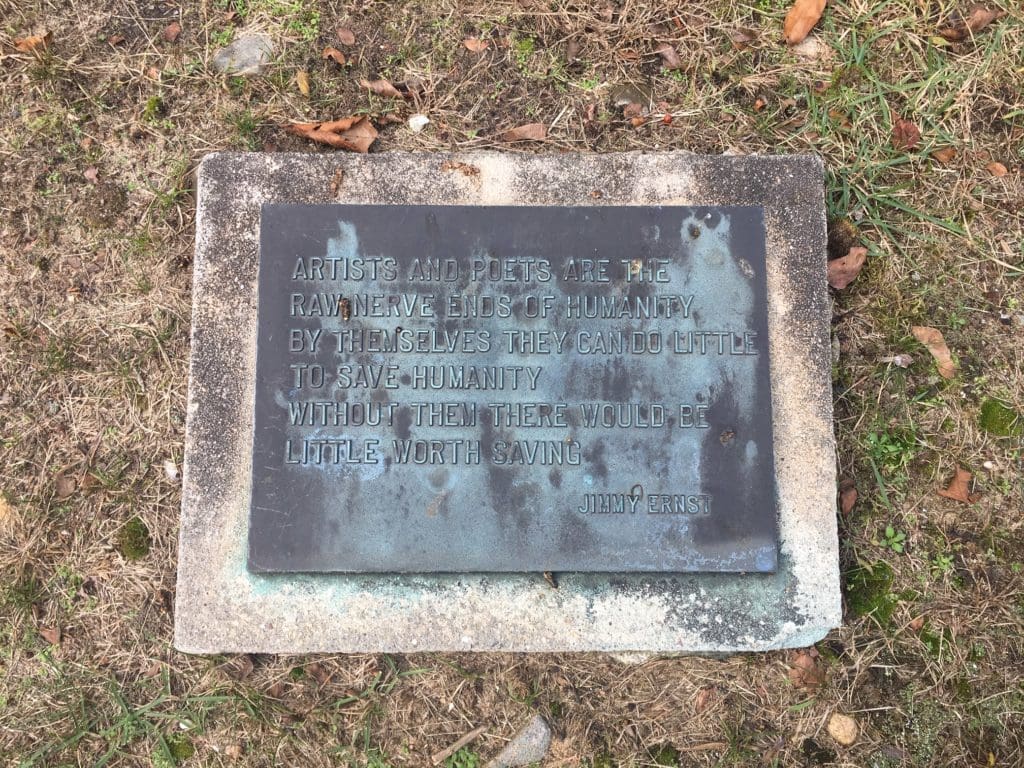 The text on Jimmy Ernst's grave begins, "Artists and poets are the raw nerve ends of humanity."
