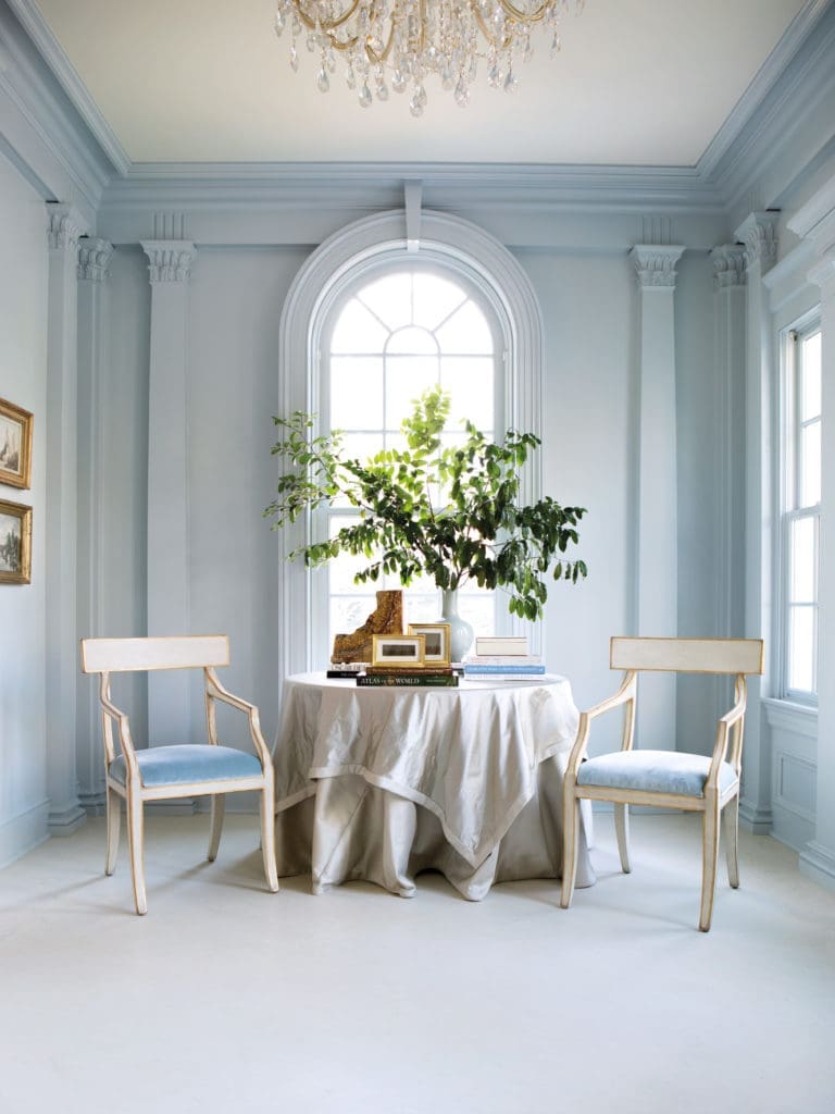 Painted the palest of pale blues, the new side entrace practically dissolves in the light. A project from Suzanne Kasler's new book. Photo by Erica George Dines.