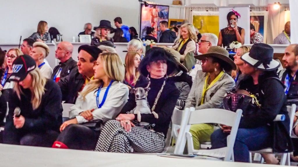 The eager audience took in the fashion show. 