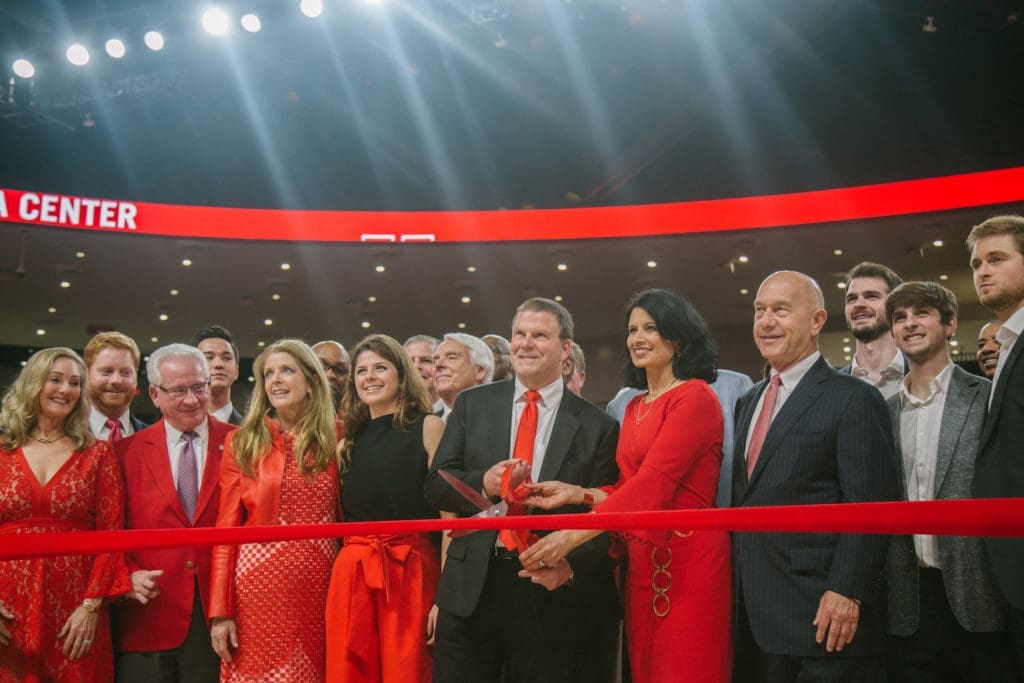 Tilman Fertitta brought an army with him on the new Fertitta Center court. (Photo courtesy University of Houston.)