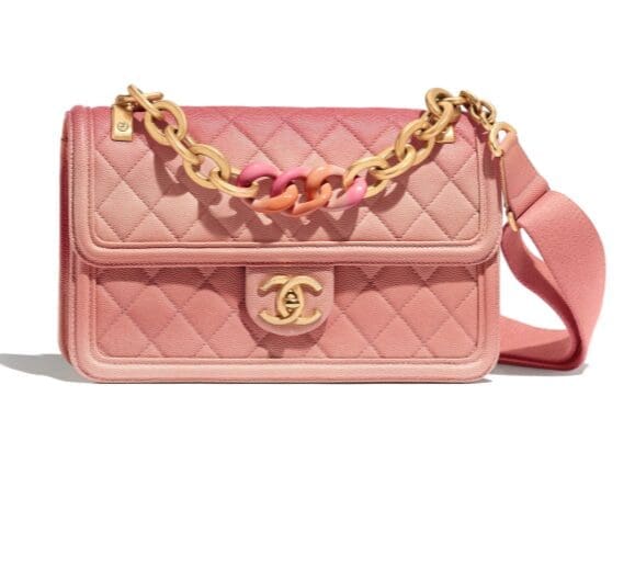Christina's Chanel flap bag, but in pink. Available at Chanel boutiques and chanel.com.