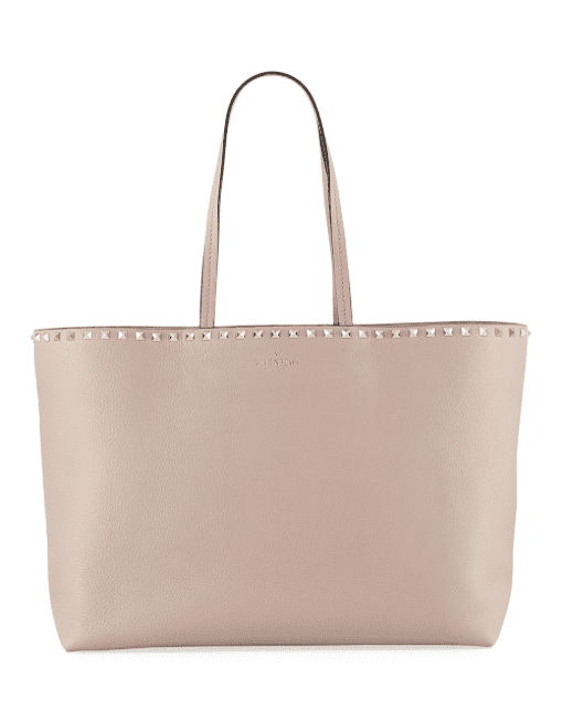 Valentino Garavani, Rockstud Vitello tote bag in beige,
$1,345, available at Neiman Marcus