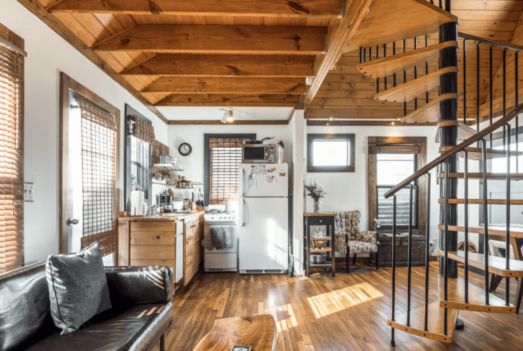 This craftsman cottage features vaulted pine ceilings and custom woodwork. 