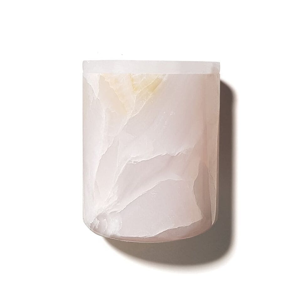 Luxuriate candles light up the room with organic aesthetics and lush aromas. 